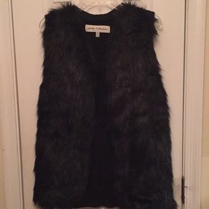 furry black vest